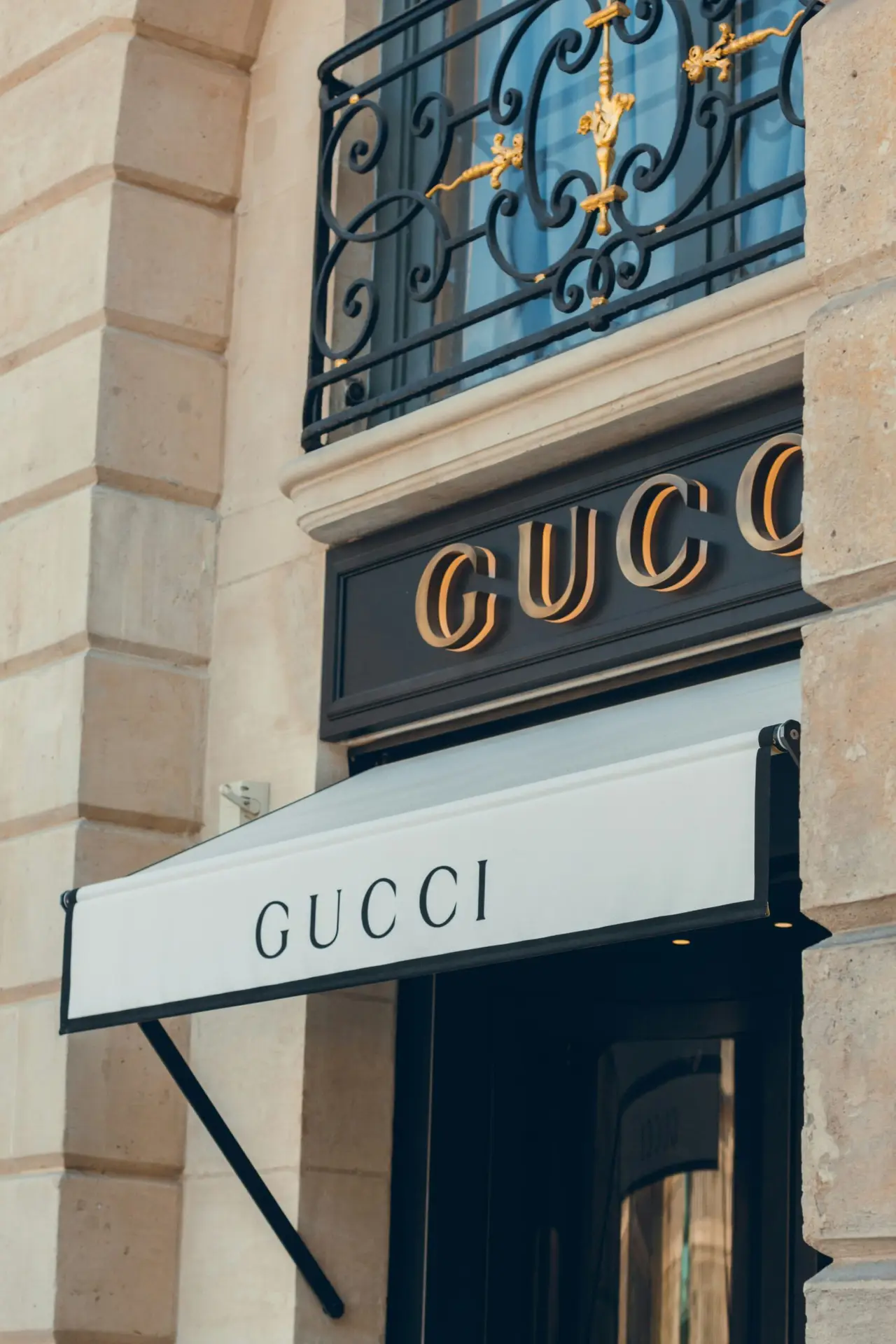 a building with a sign that says gucci. The Gucci Affiliate Program