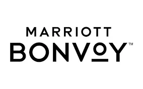 Marriott Bonvoy logo featuring the words "Marriott Bonvoy" in bold, uppercase letters on a white background, making it easy to understand and recognize.