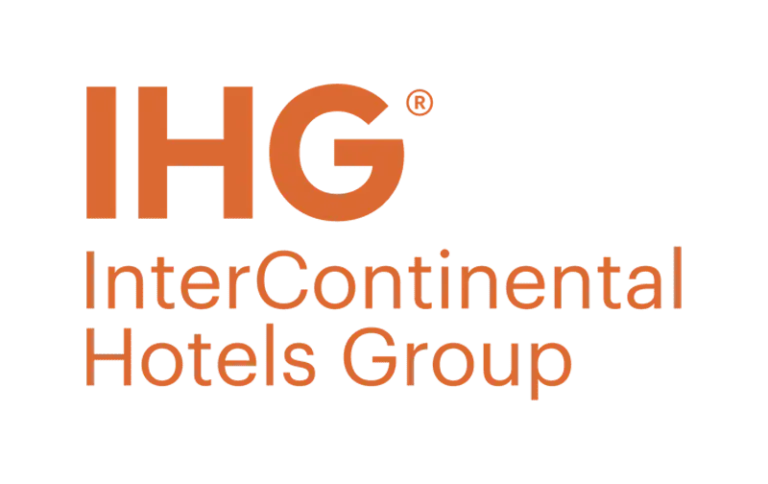 Logo of InterContinental Hotels Group (IHG) featuring the acronym "IHG" in large orange lettering, with "InterContinental Hotels Group" written below in smaller, orange text, emblematic of their IHG Rewards Club.