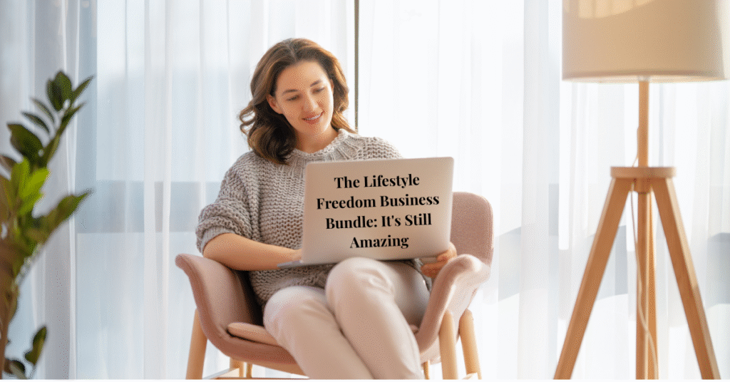 A woman sits in a chair, smiling at her laptop screen, which displays the text, "The Lifestyle Freedom Bundle: It's Still Amazing.