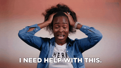 A person holding their head with both hands and looking stressed, with the text "I NEED HELP WITH THIS." at the bottom, highlighting Free Marketing Guides as a solution.